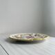 Decorative wall plate in hand-painted earthenware