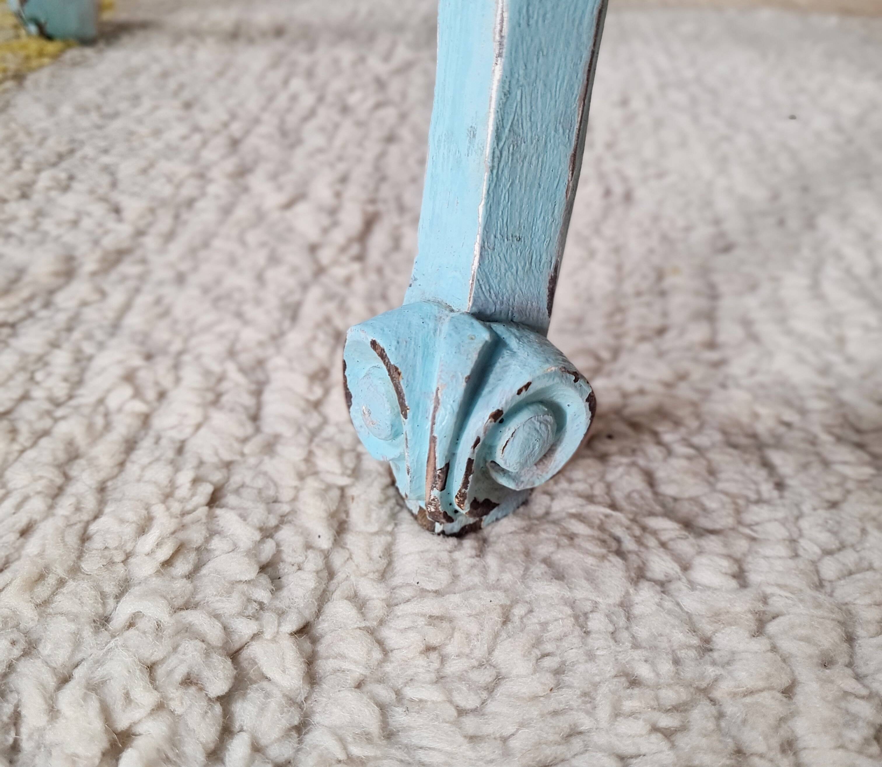 Small vintage bedside table in azure blue patina.