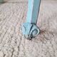 Small vintage bedside table in azure blue patina.