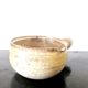 Beige glazed terracotta caquelon