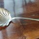 Old silver metal strawberry serving shovel spoon Ercuis goldsmith lily of the valley model