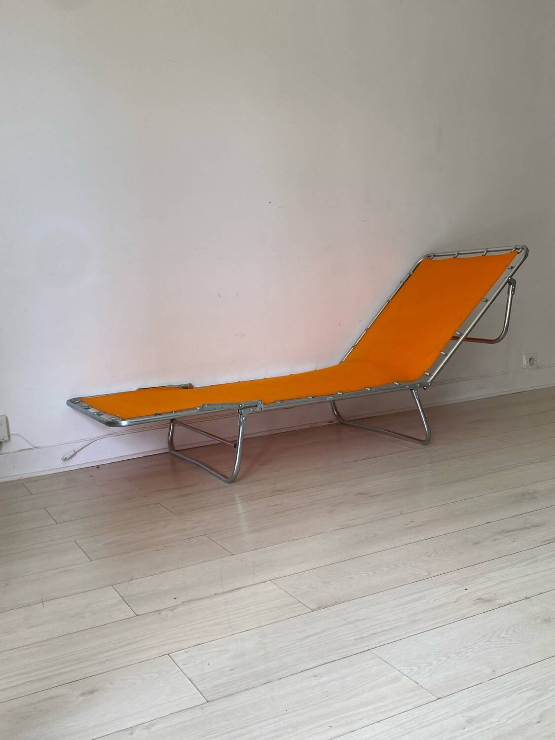 Orange and metal deckchair 1970
