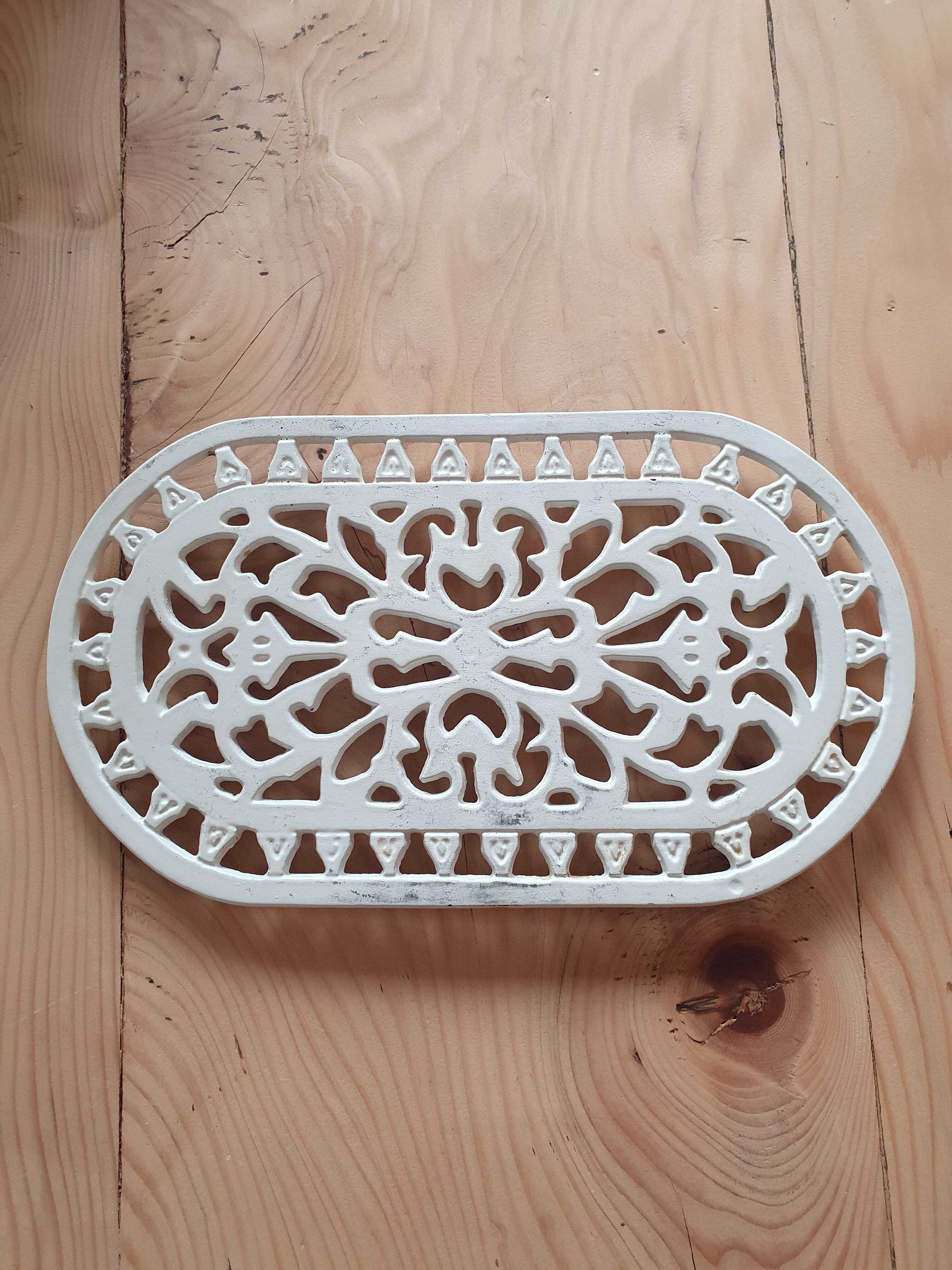 Dessous de plat en fonte