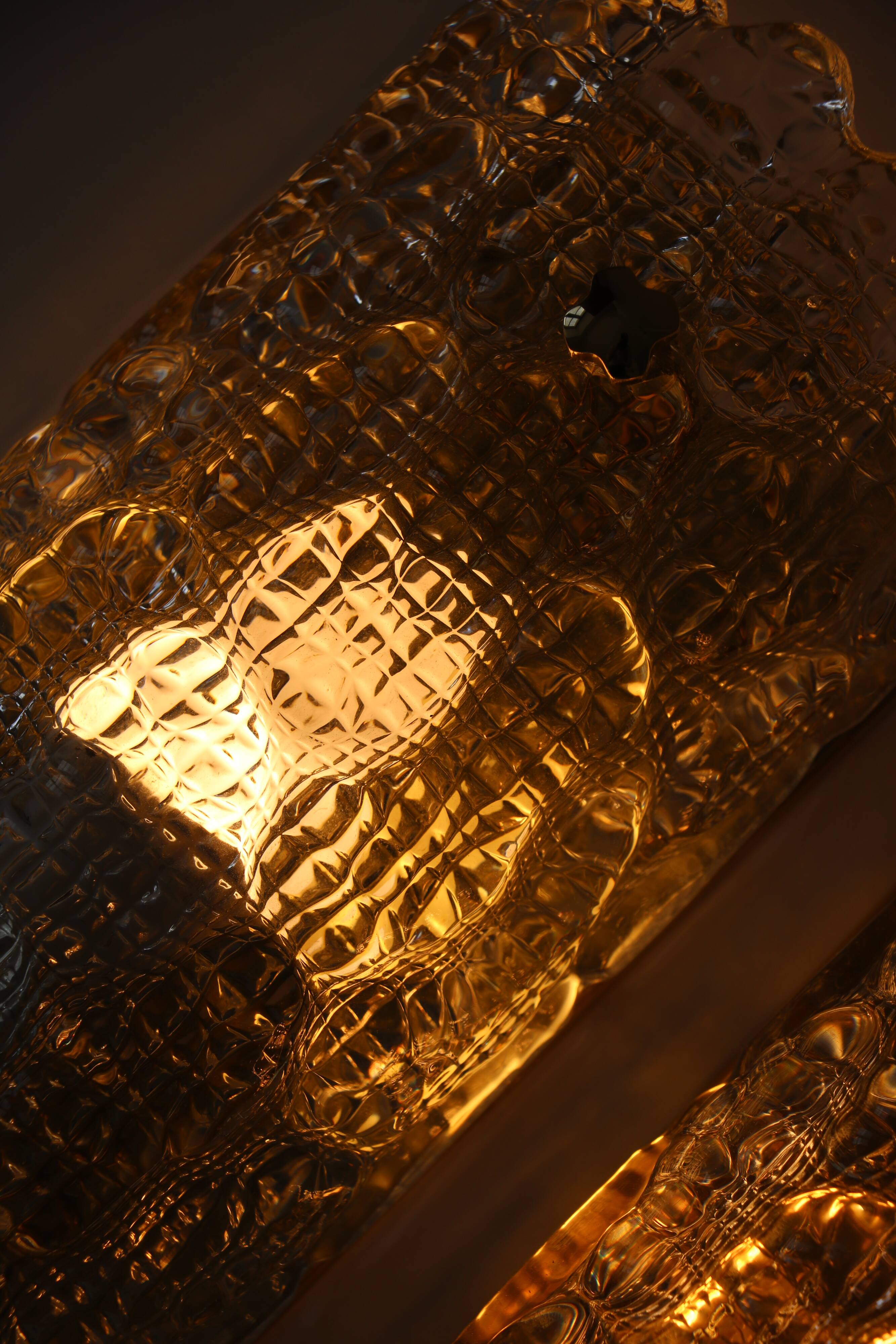 Pair of glass and brass wall lights by Carl Fagerlund for Orrefors.