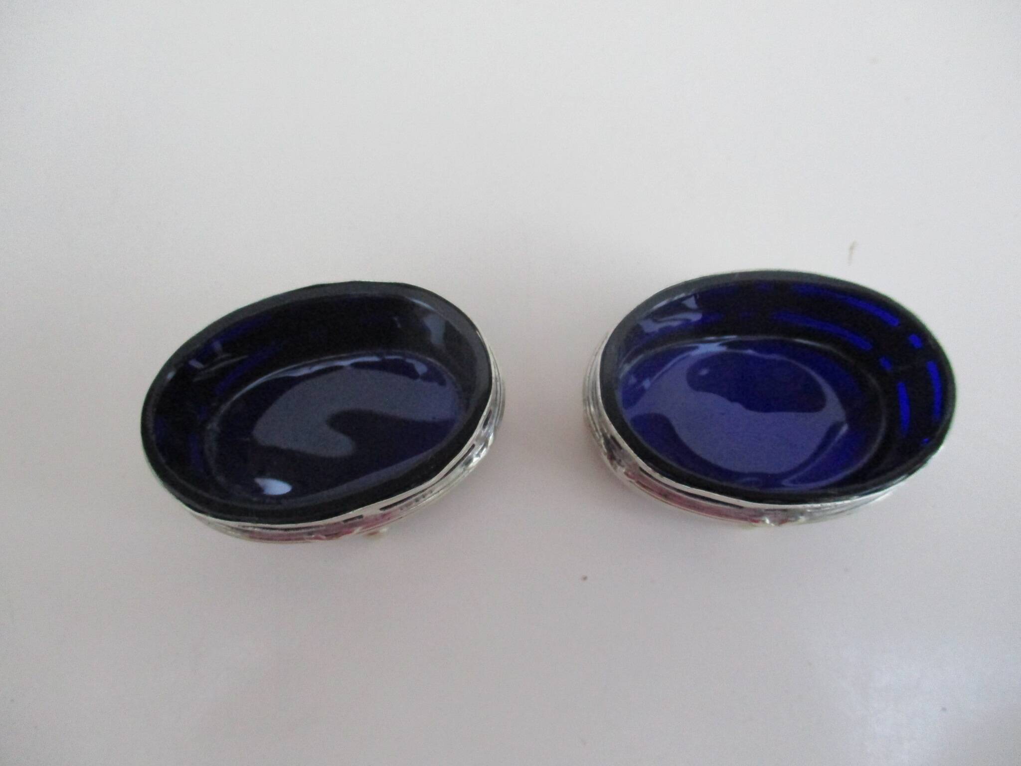 Silver metal and cobalt glass salt pots - EP St & co