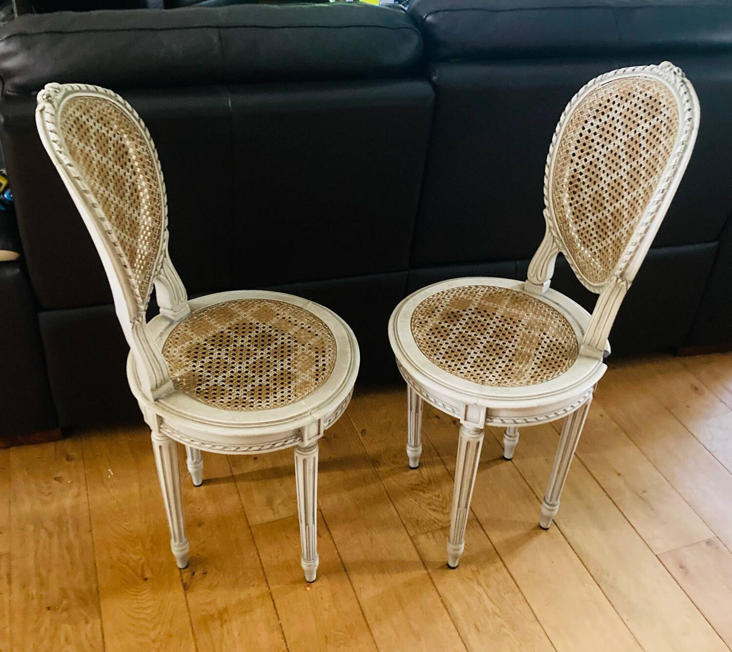 Pair of Louis XVI chairs from the late 19th century with checkerboard caning