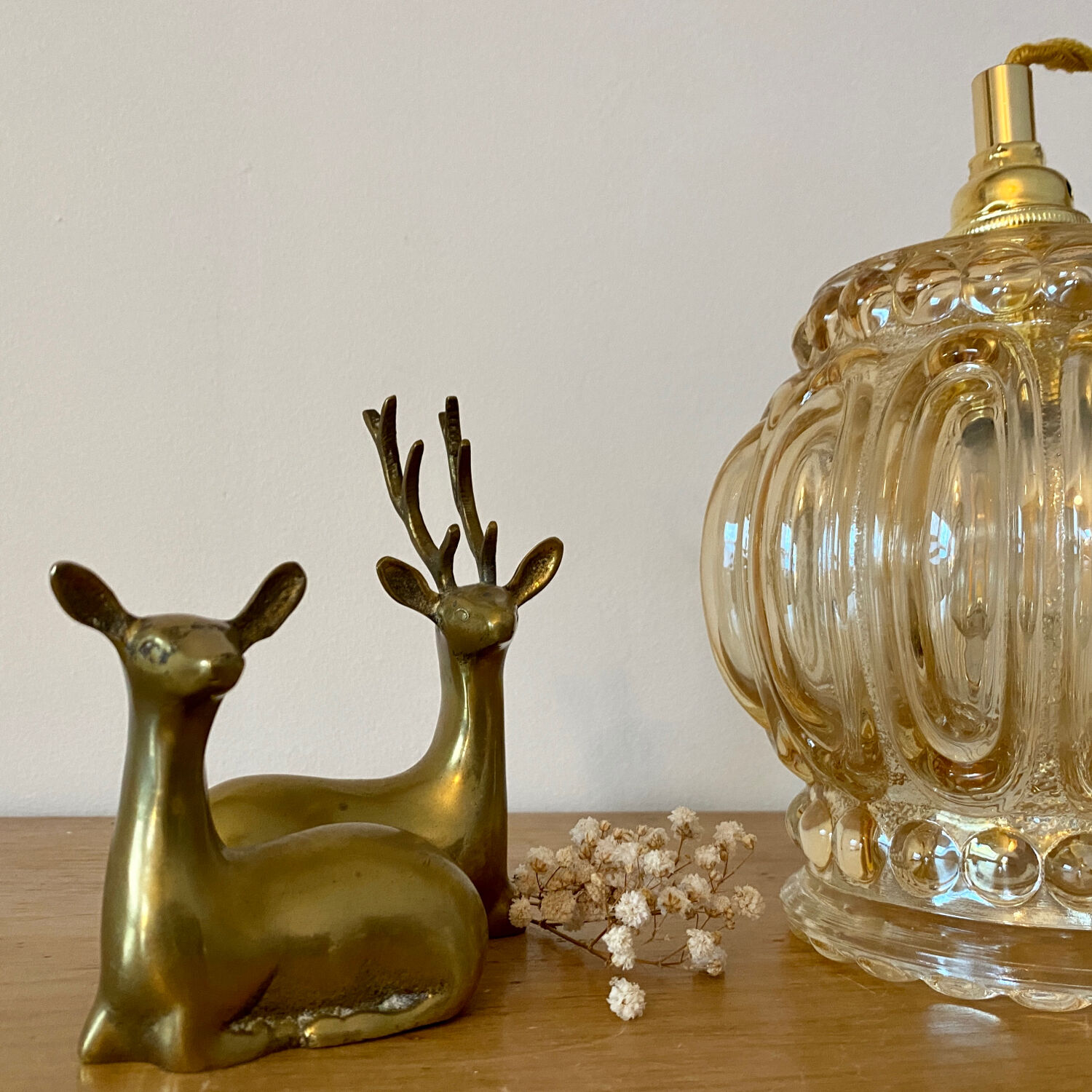 Baladeuse tulipe vintage en verre ambré