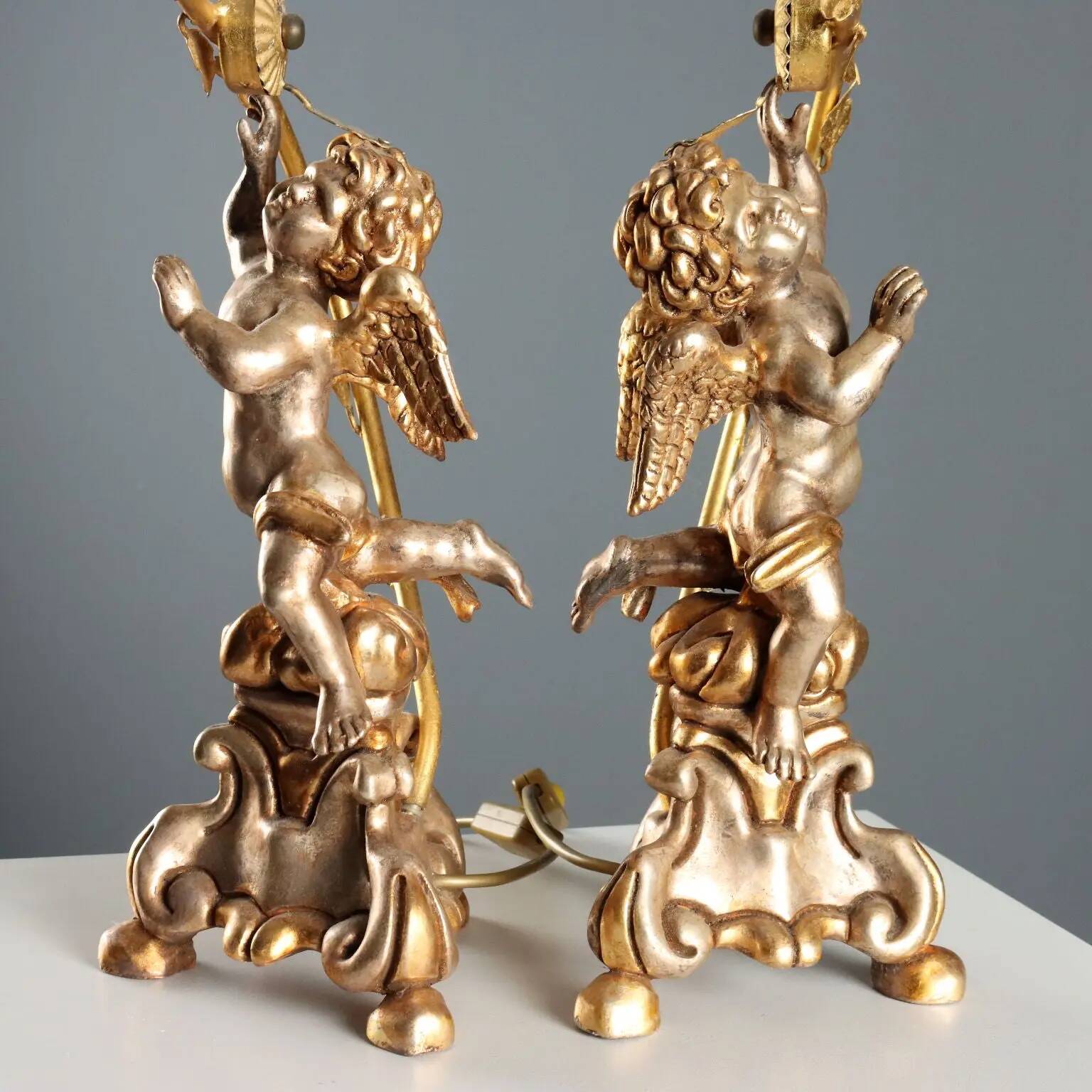 Pair of antique candelabra in carved and gilded wood, Italy, 20th century