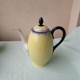Coffee pot or teapot, sugar bowl and milk jug in porcelain.