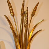 Golden metal wall sconce