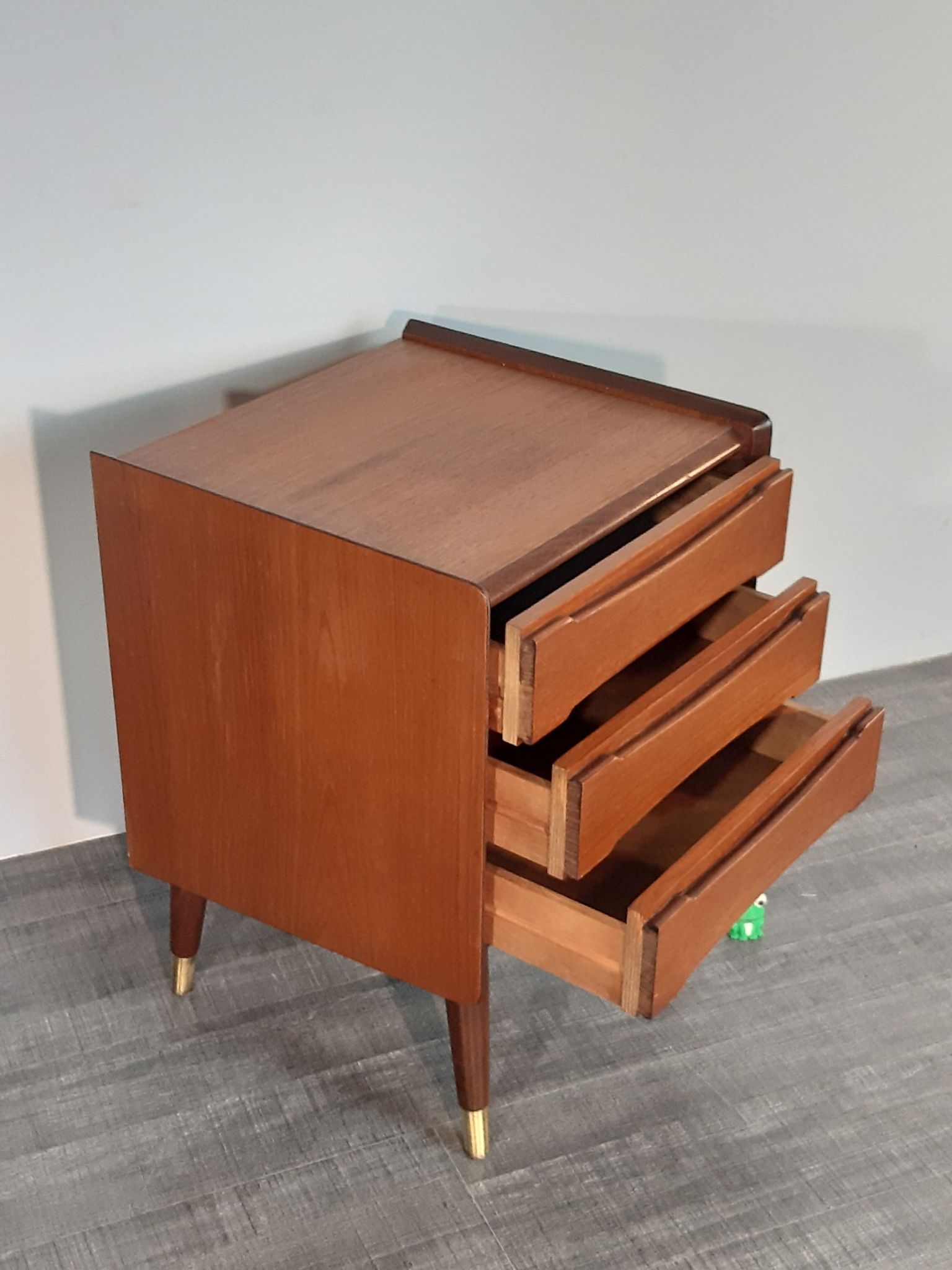Norwegian bedside table with 3 drawers, teak and brass clogs