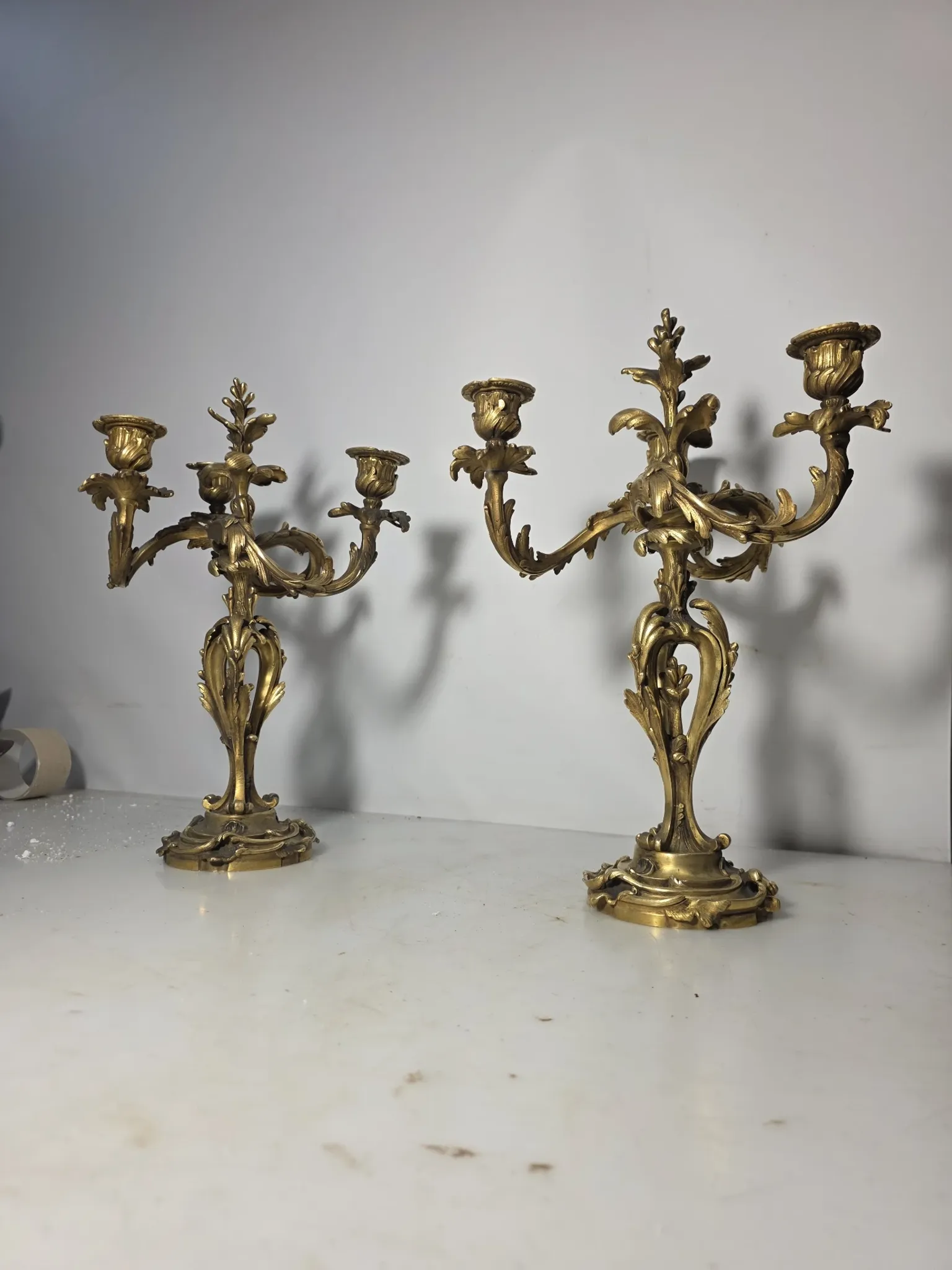 Pair of Louis XV style bronze candlesticks from the 19th century.
