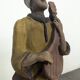 Statue orientale joueur de mandoline