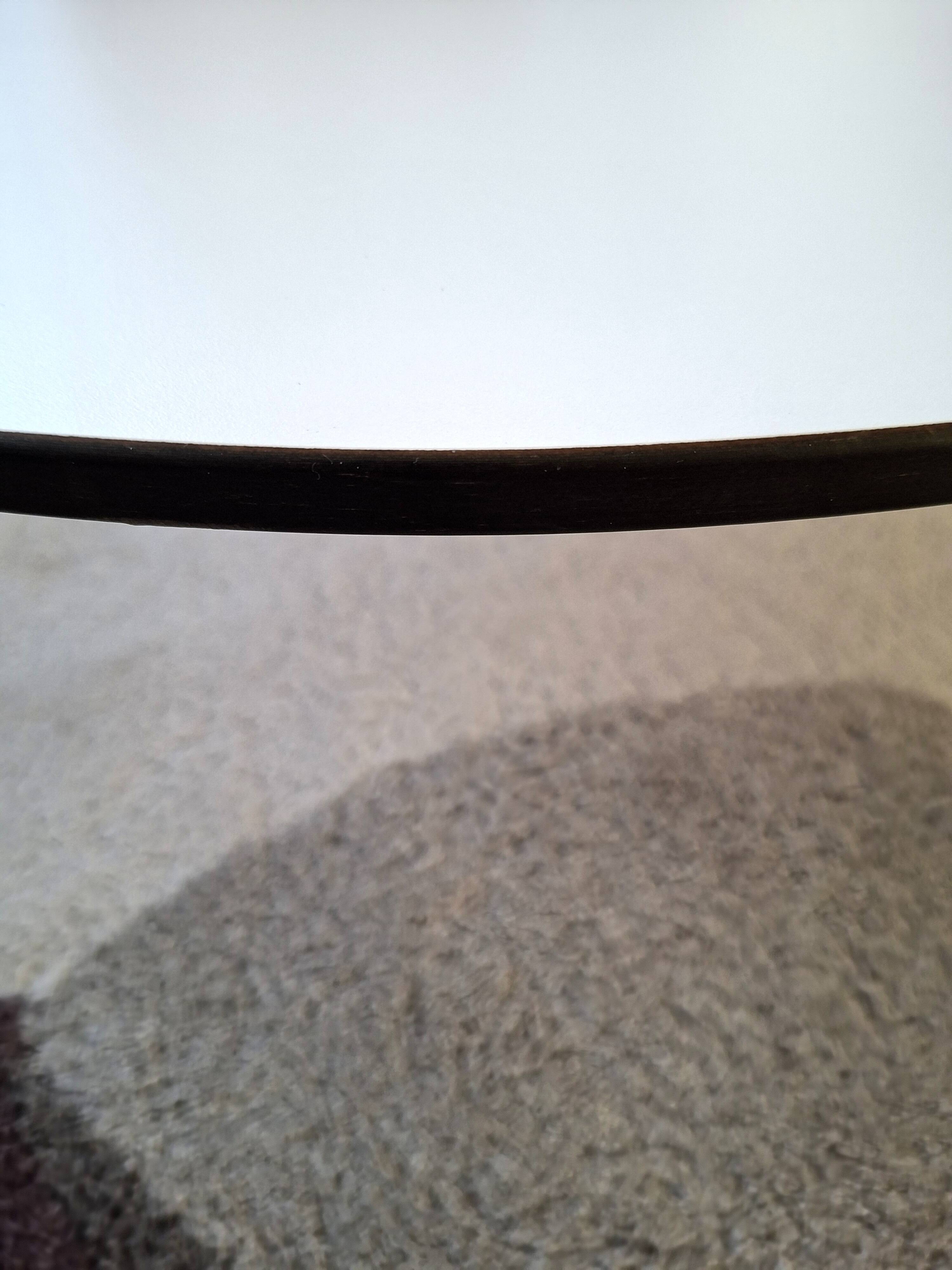 Table with orange slice by Paulin Artifort.