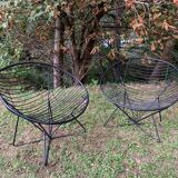 Pair of round chairs in black tubular steel 1960