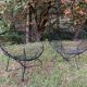 Pair of round chairs in black tubular steel 1960
