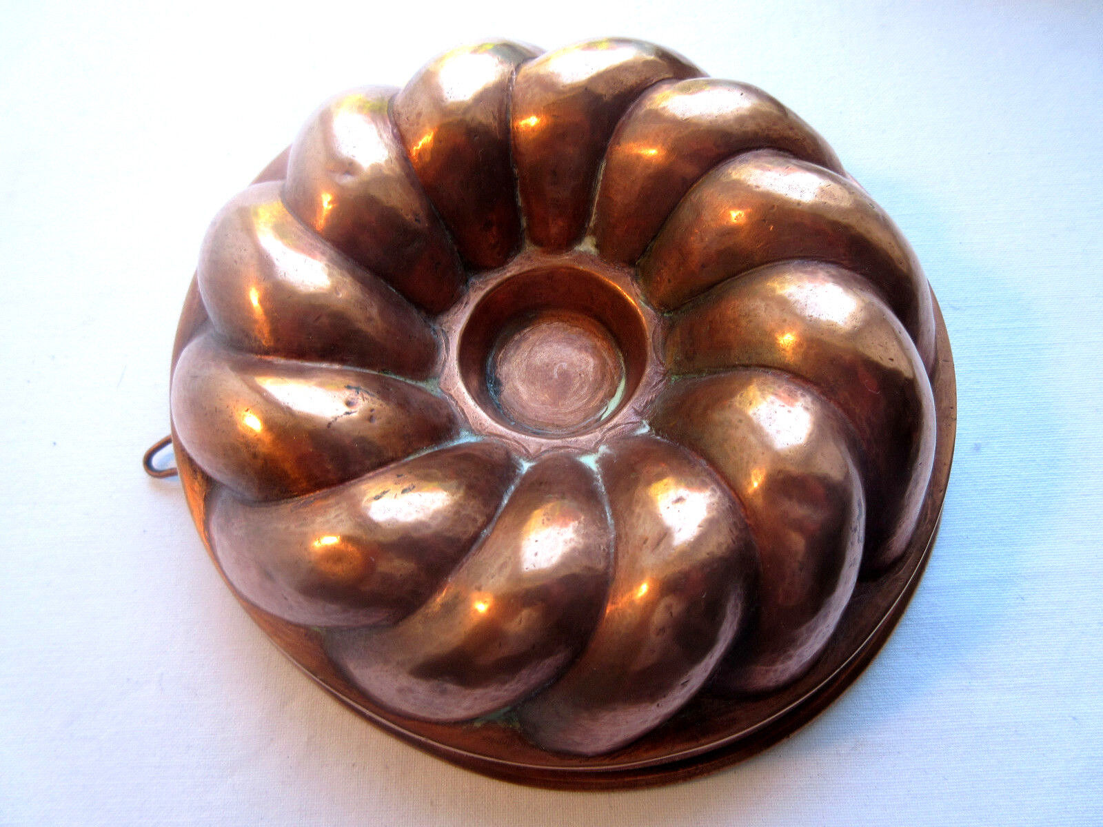 Old copper cake pan, braided crown, kitchen utensil