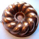 Old copper cake pan, braided crown, kitchen utensil