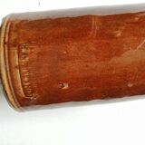 Old bottle in varnished ground.