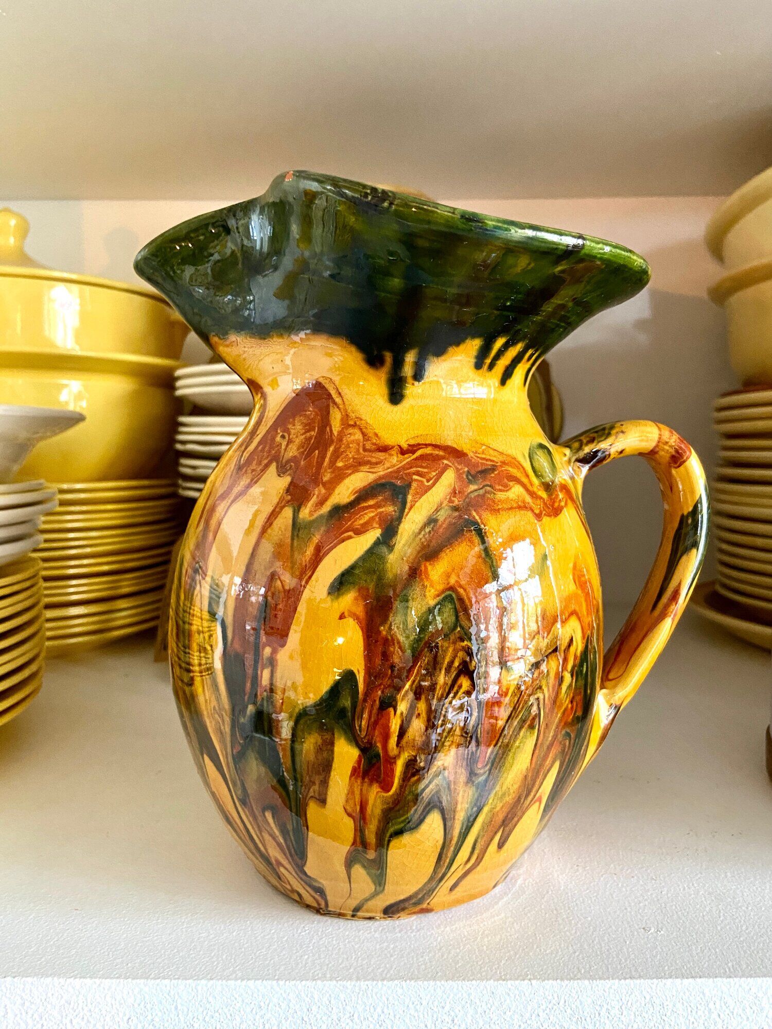 Glazed ceramic pitcher
