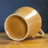 Jug and 5 cups in orange stoneware, very good condition, signed and numbered