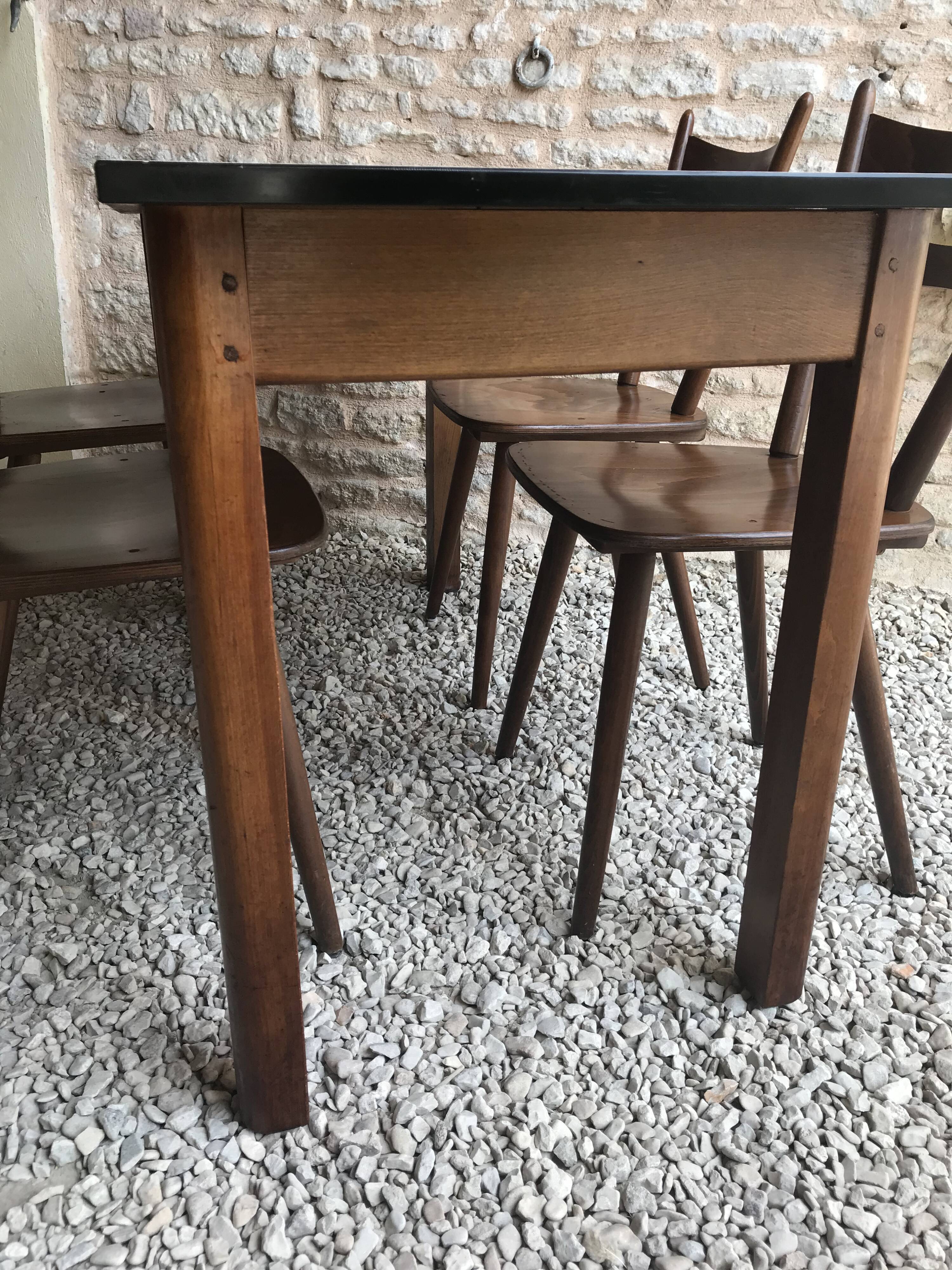 Vintage bistro table half-centuries wood and formica chiné