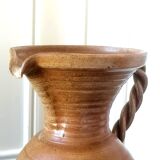 Sandstone jug with twisted handle