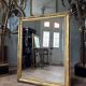 Restoration period mirror in gilded wood from the Napoleonic III era, 165 cm x 130 cm.
