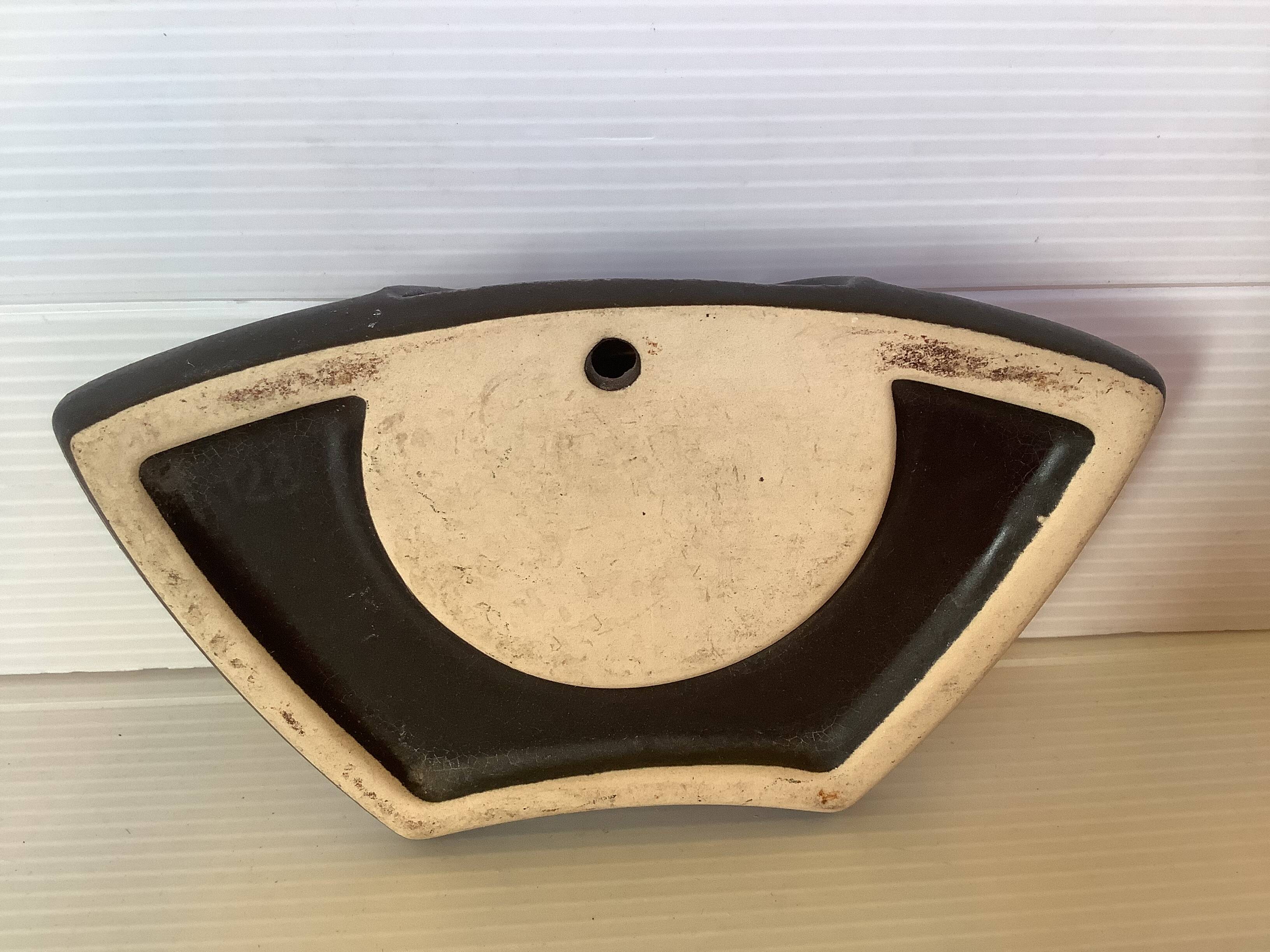 Asymmetrical black flower vase