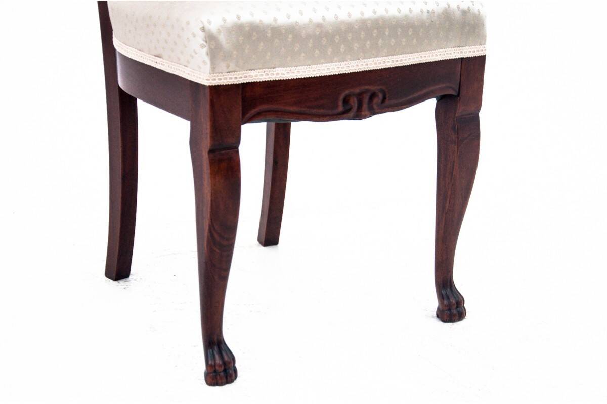 Late 19th century lion's paw table with chairs, Northern Europe.