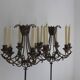 Candles on feet,  candelabras