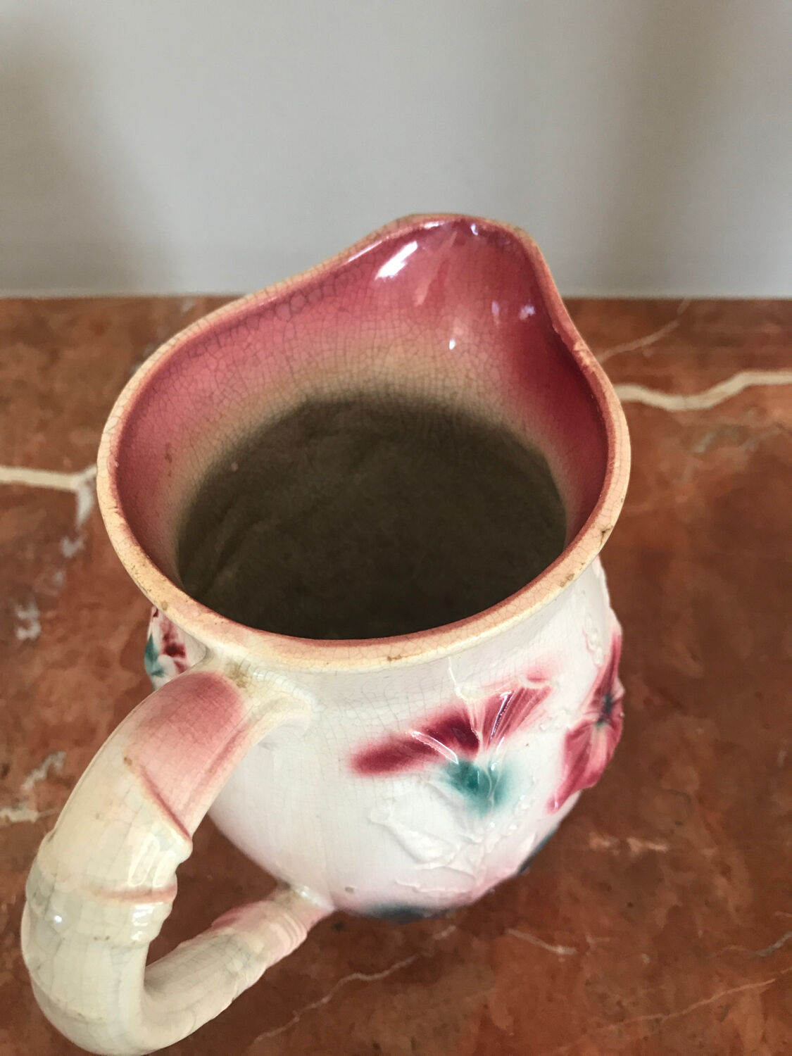 Pitcher in pink slip