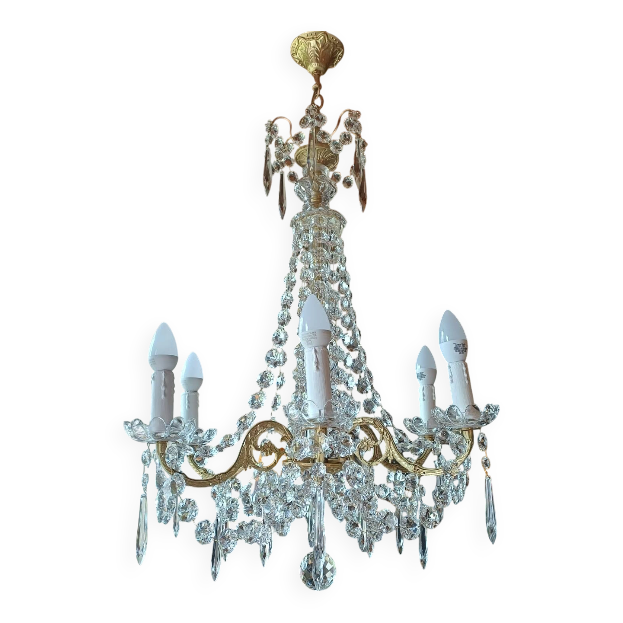 Antique chandelier with pendants in bronze and crystal.