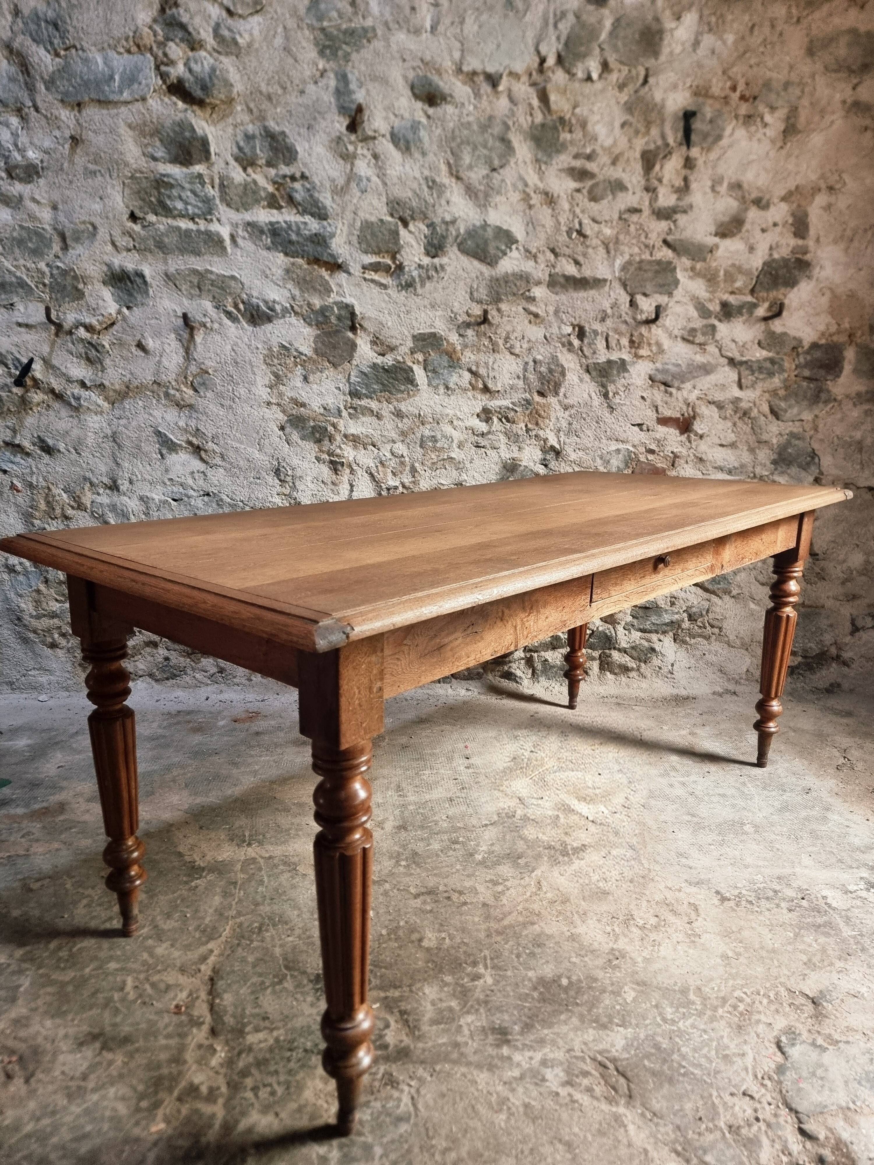 Antique oak dining table with drawer – France, early 20th century
