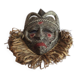 African mask with raffia and kaolin dots
