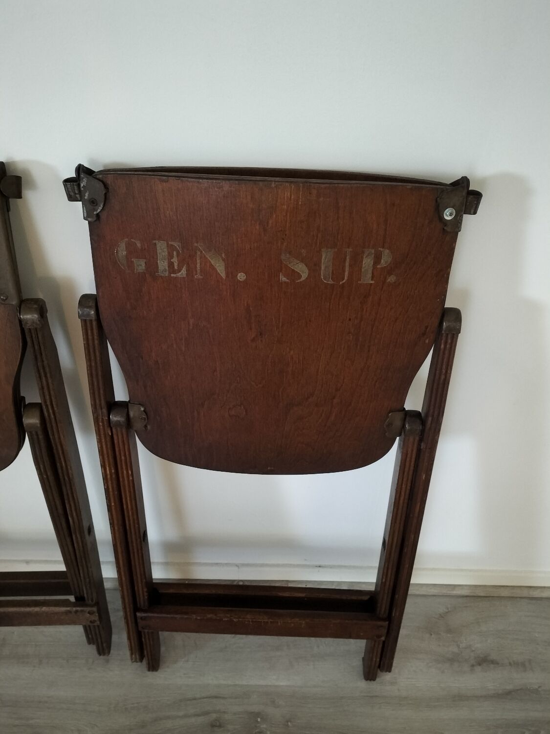 Folding chairs in US armed wood