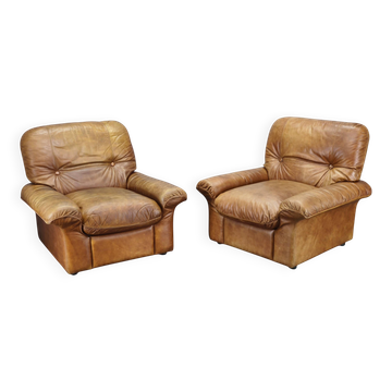 Paire de fauteuils lounge en cuir buffle cognac Arcon Italia