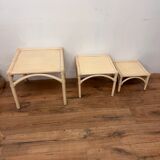 Three stackable rattan and bamboo Maugrion coffee tables