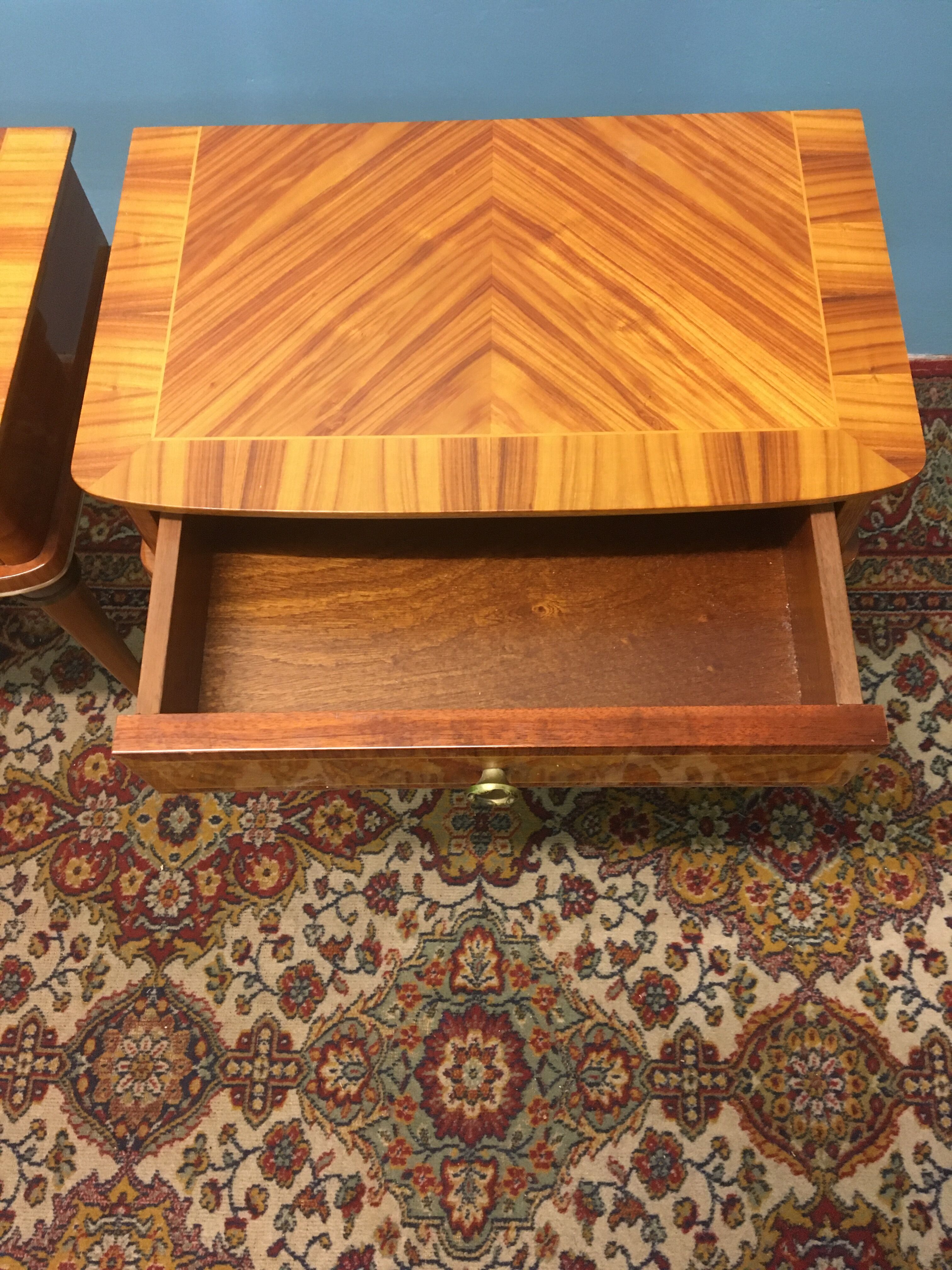 Pair of rosewood and brass bedsides circa 1950