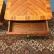 Pair of rosewood and brass bedsides circa 1950