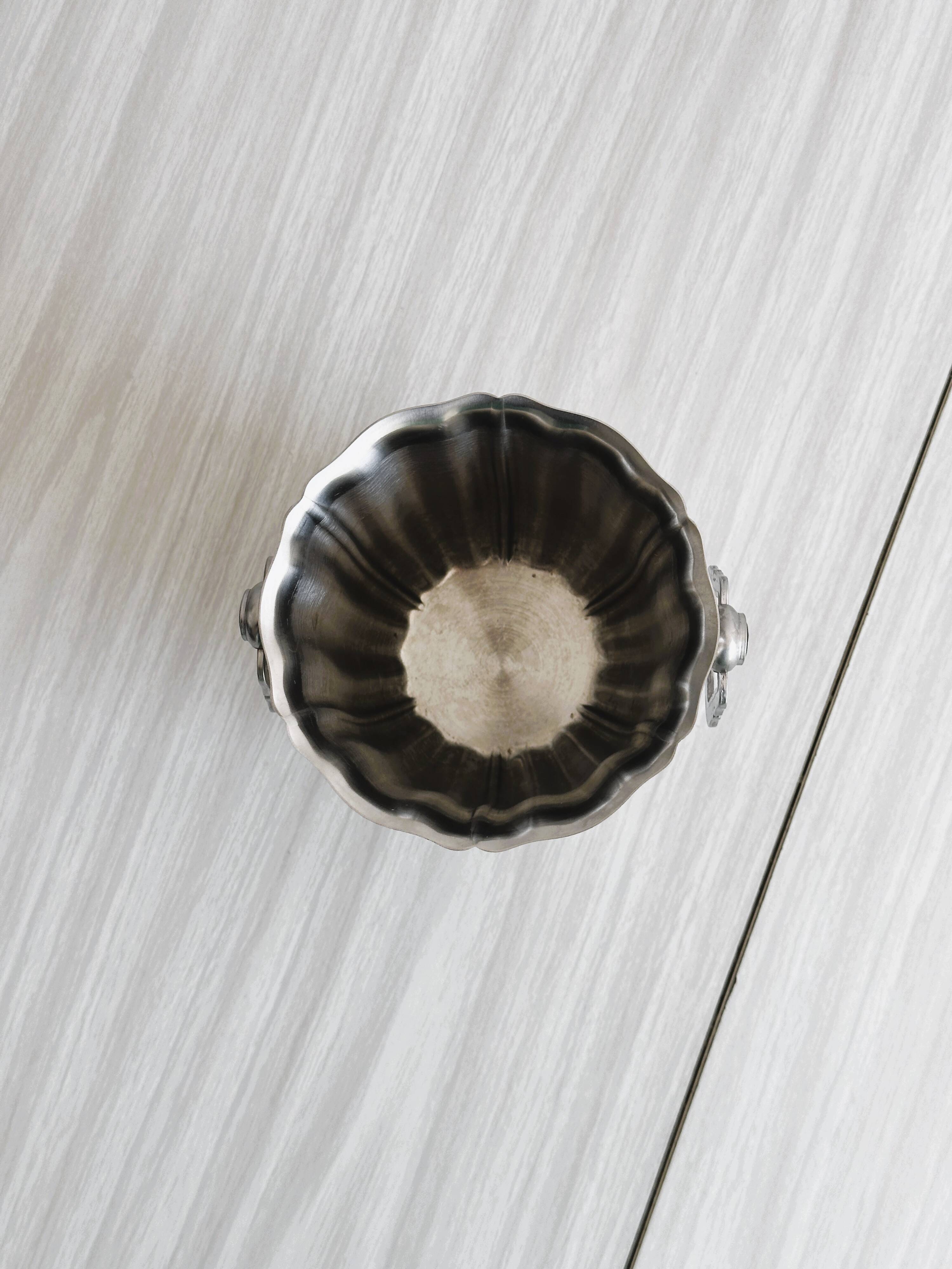 Small shiny stainless steel ice bucket