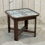 Art Deco side table in mahogany and top covered with a fabric under glass plate