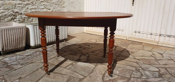 Table ronde ovale à abattants merisier massif époque XIX°