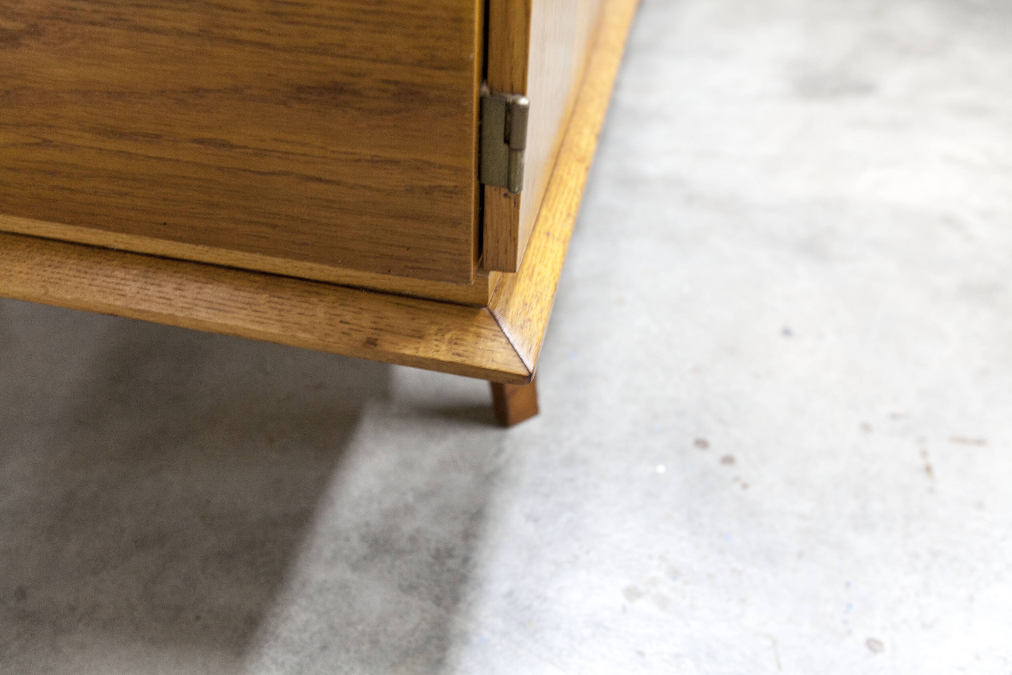 French wardrobe with tapered legs, 3 doors, 1 mirror (27*130), and 1 drawer.