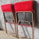 Pair of folding chairs in vintage red moumoute