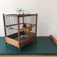 Former wooden birdcage
