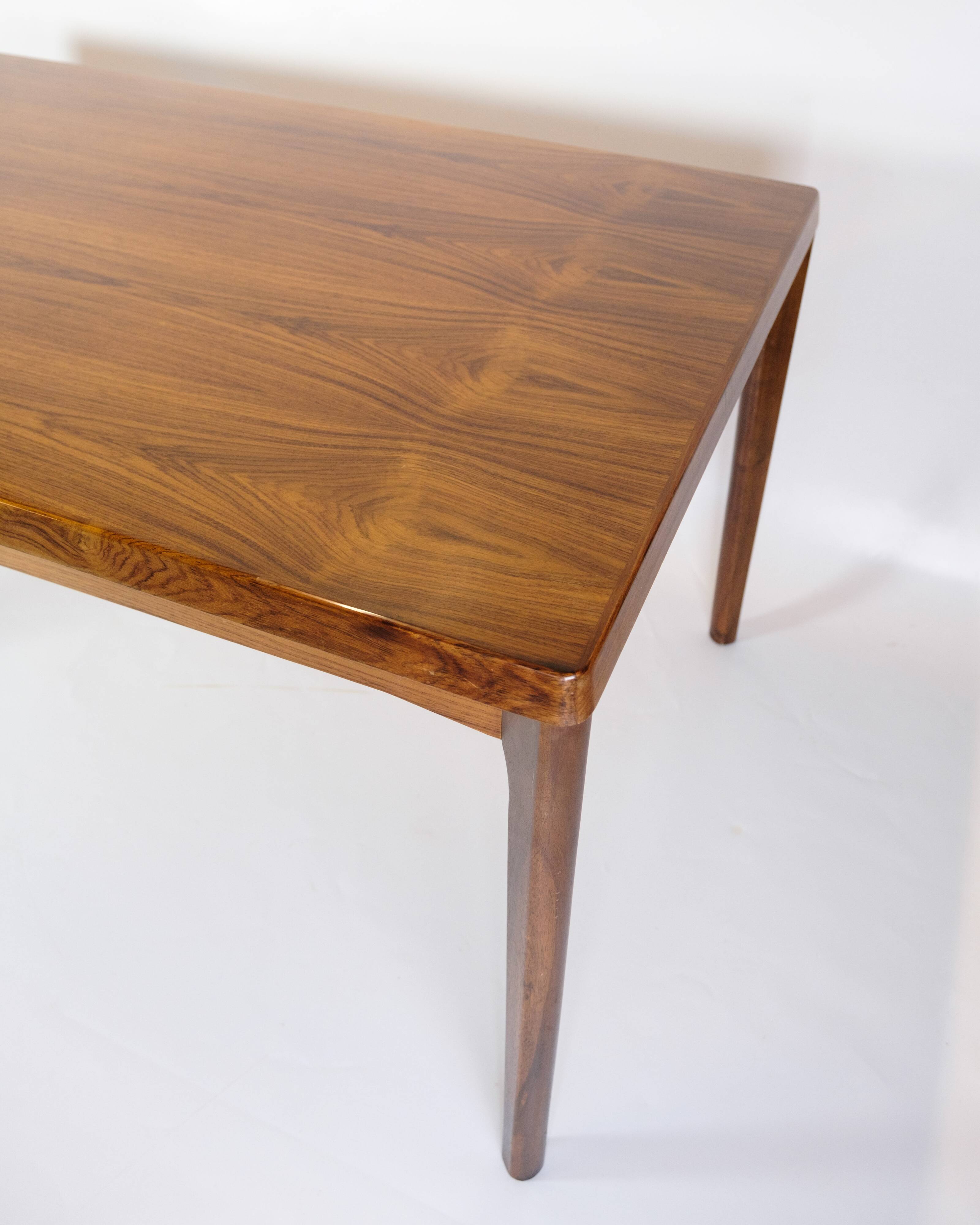 Dining Table With extensions Made In Rosewood By Henning Kjærnulf From 1960s
