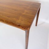 Dining Table With extensions Made In Rosewood By Henning Kjærnulf From 1960s