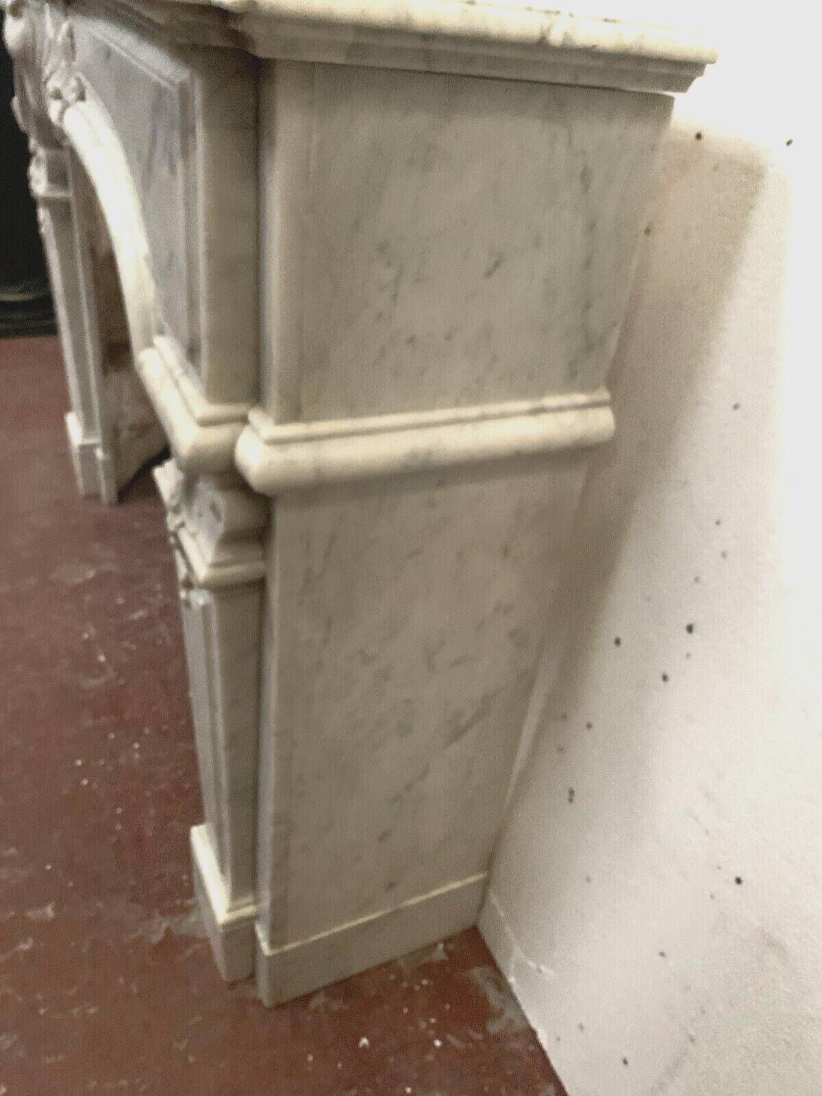 Regency style fireplace in white Carrara marble, Italy, 19th century.
