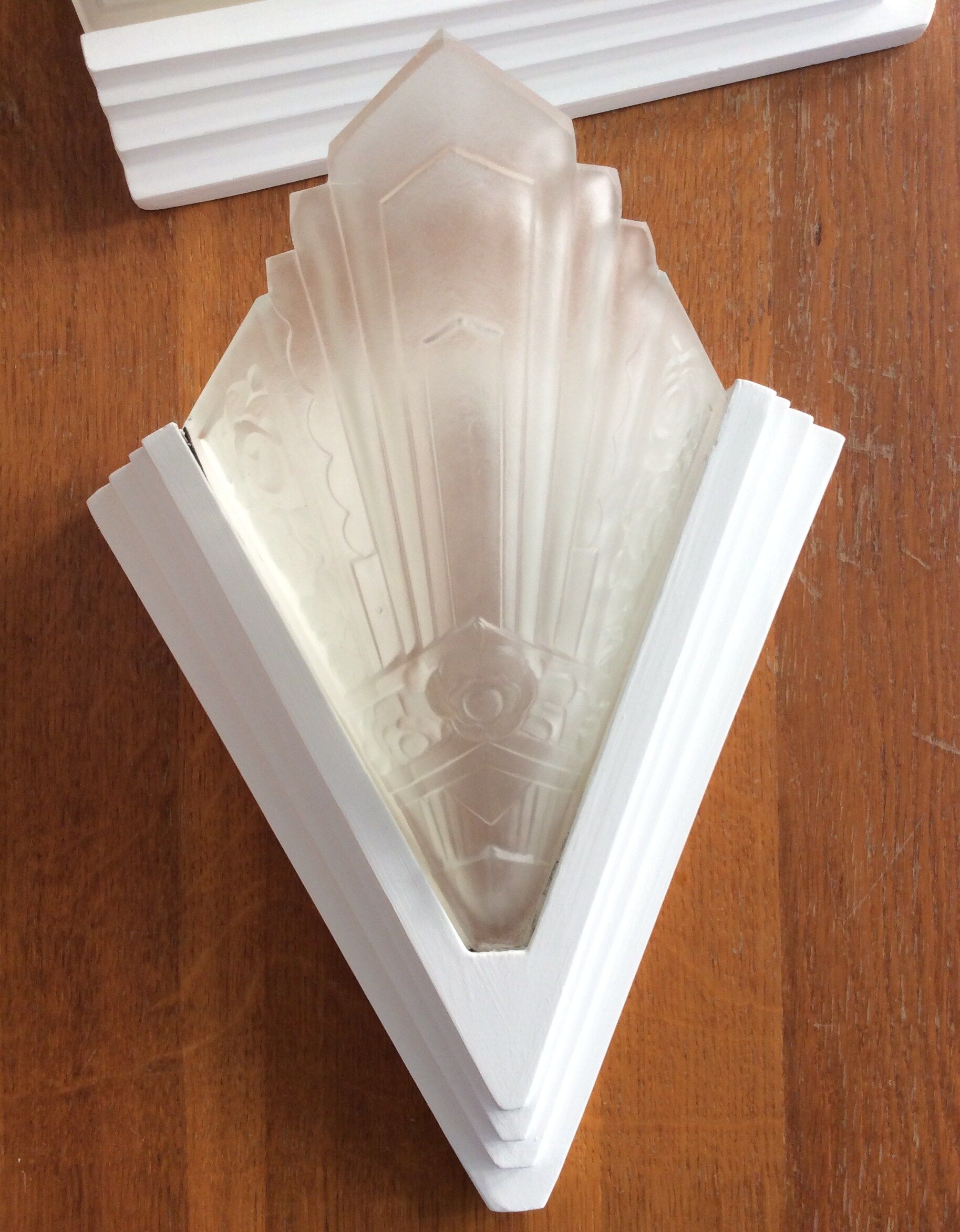 Pair of art deco-style pressed glass sconces